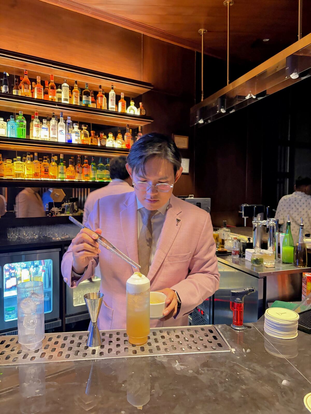 Bartender crafting a cocktail at 1970 Bar x Visk Bar Takeover, Taj Deccan Hyderabad