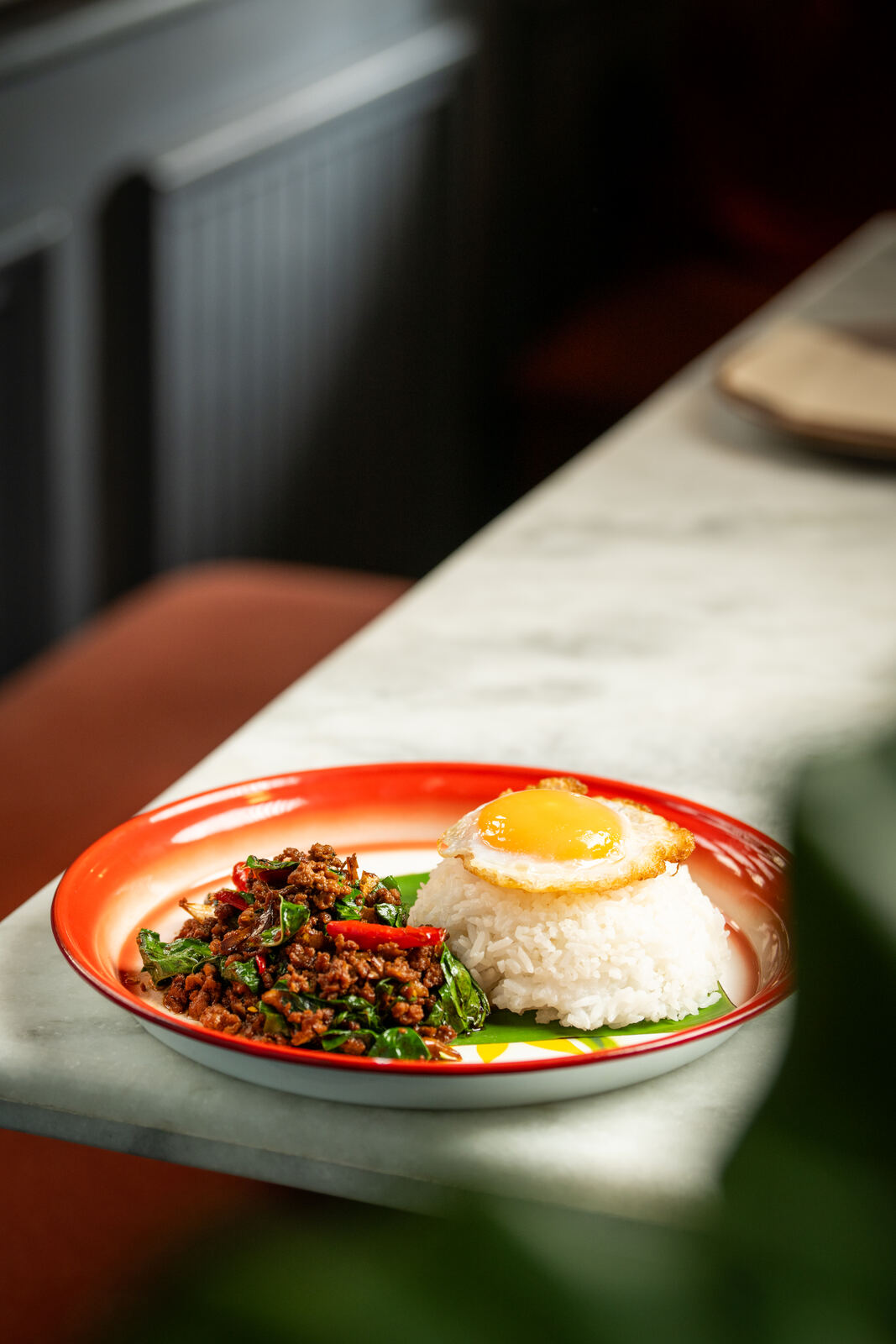 Phad Krapao Thai basil chicken with crispy fried egg at Baan Phadthai Knowledge City Hyderabad