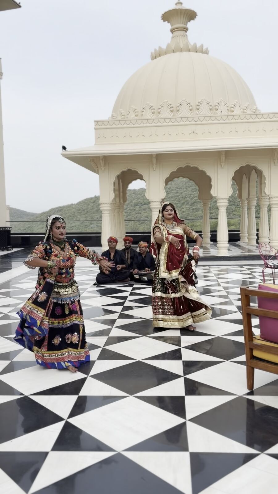 Rajasthani folk dancers performing during sunset high tea at Fairmont Udaipur Palace