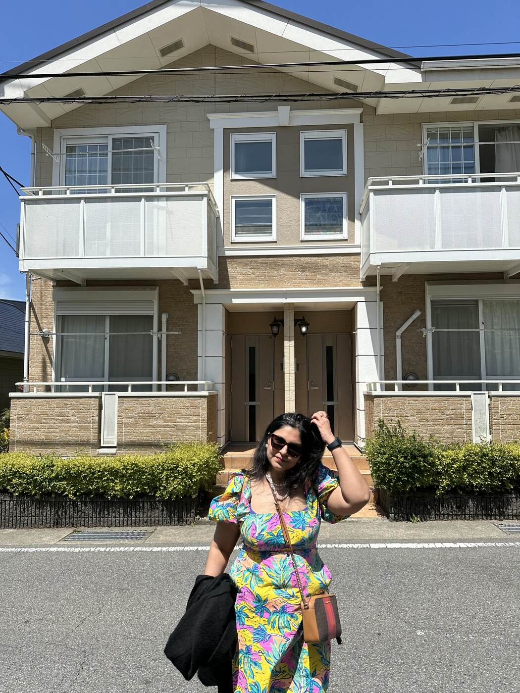 Exterior of the Doraemon-themed Airbnb in Hakone, Japan with dedicated parking spot