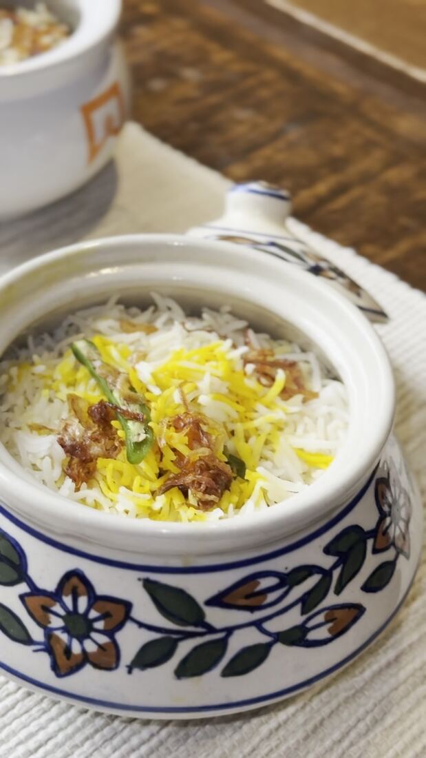 Dum Pukht Biryani served in a handi at ITC Kakatiya's 30th anniversary celebration, Hyderabad