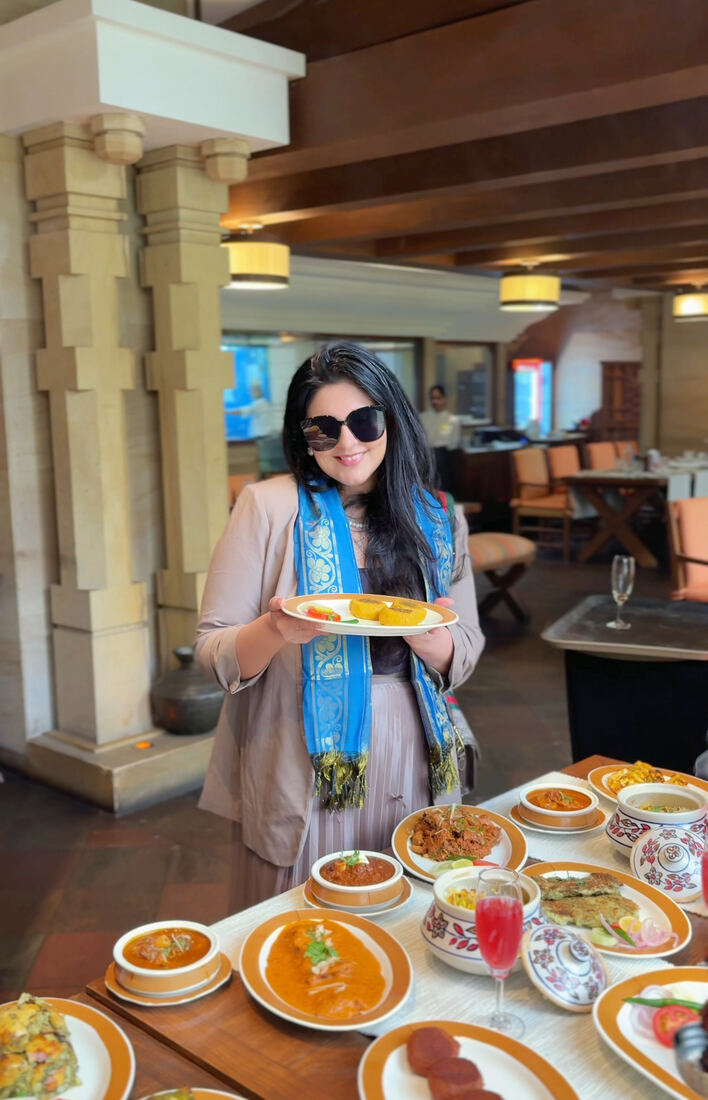 Reema with a chef's plate at ITC Kakatiya's 30th anniversary spread of kebabs and kurries, Hyderabad