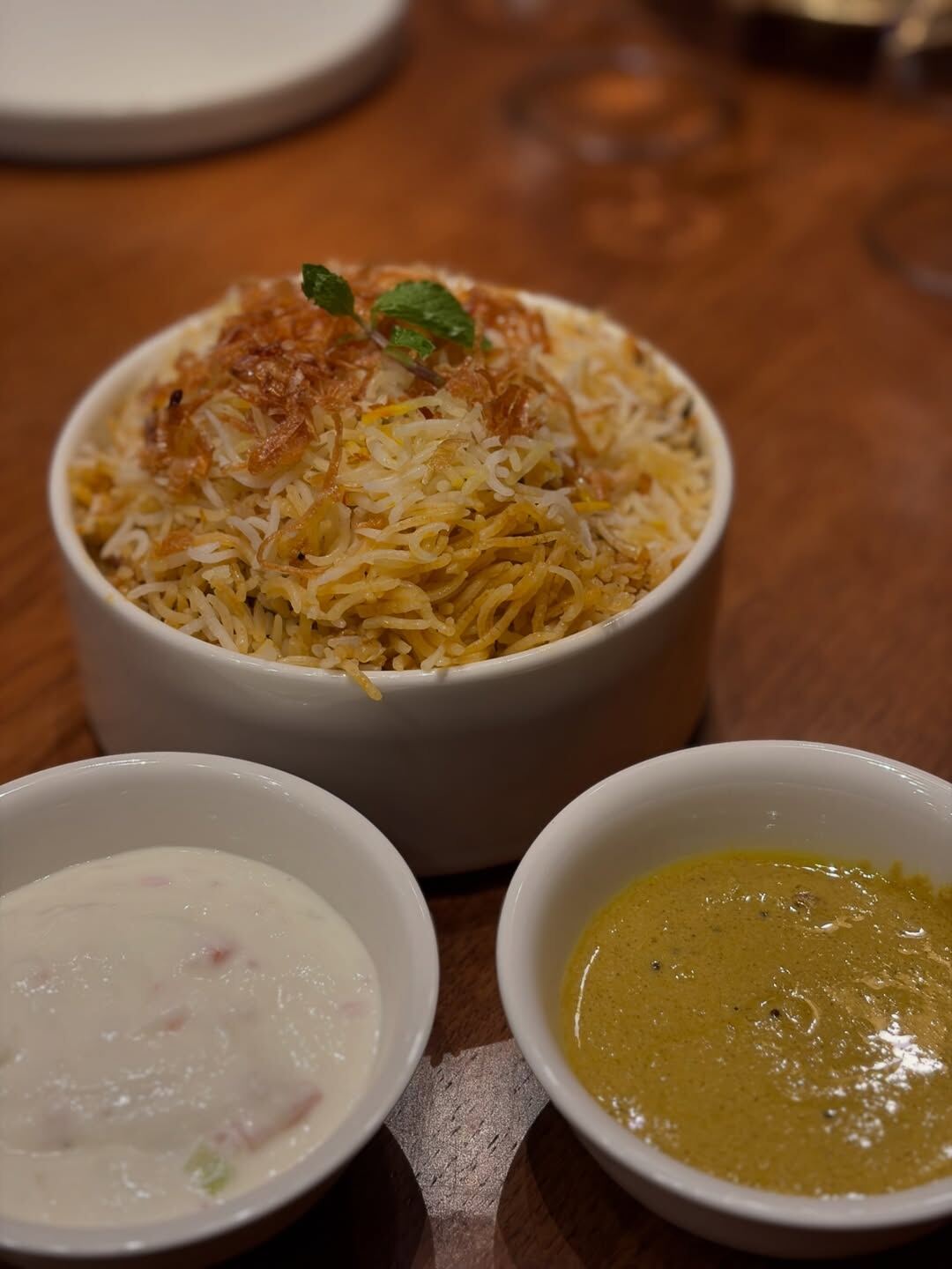 Zafrani Kacche Gosht Ki Biryani at Oota Hyderabad — fragrant Hyderabadi biryani
