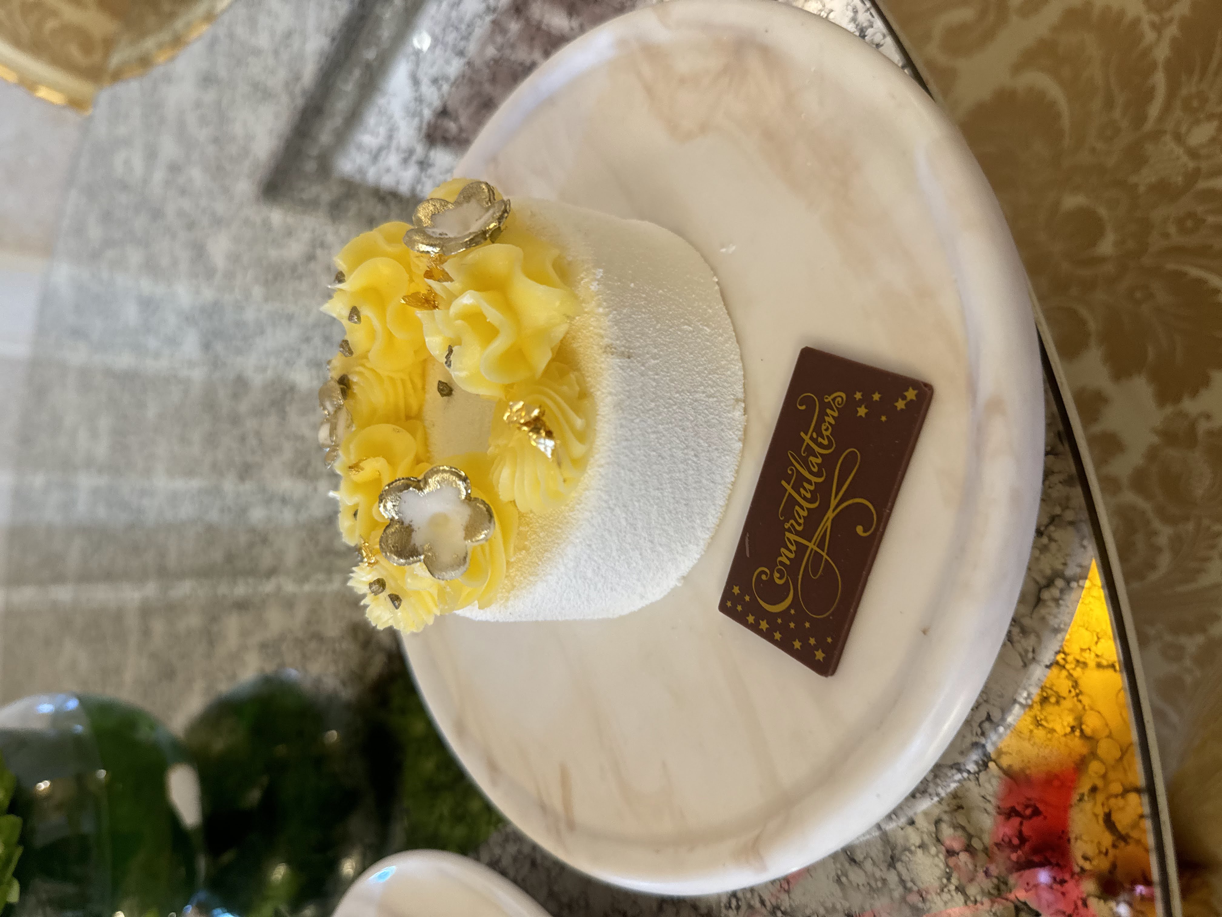 Birthday surprise celebration at Raffles The Palm Dubai with cake balloons and decorations - One Punjabi Binger birthday luxury travel