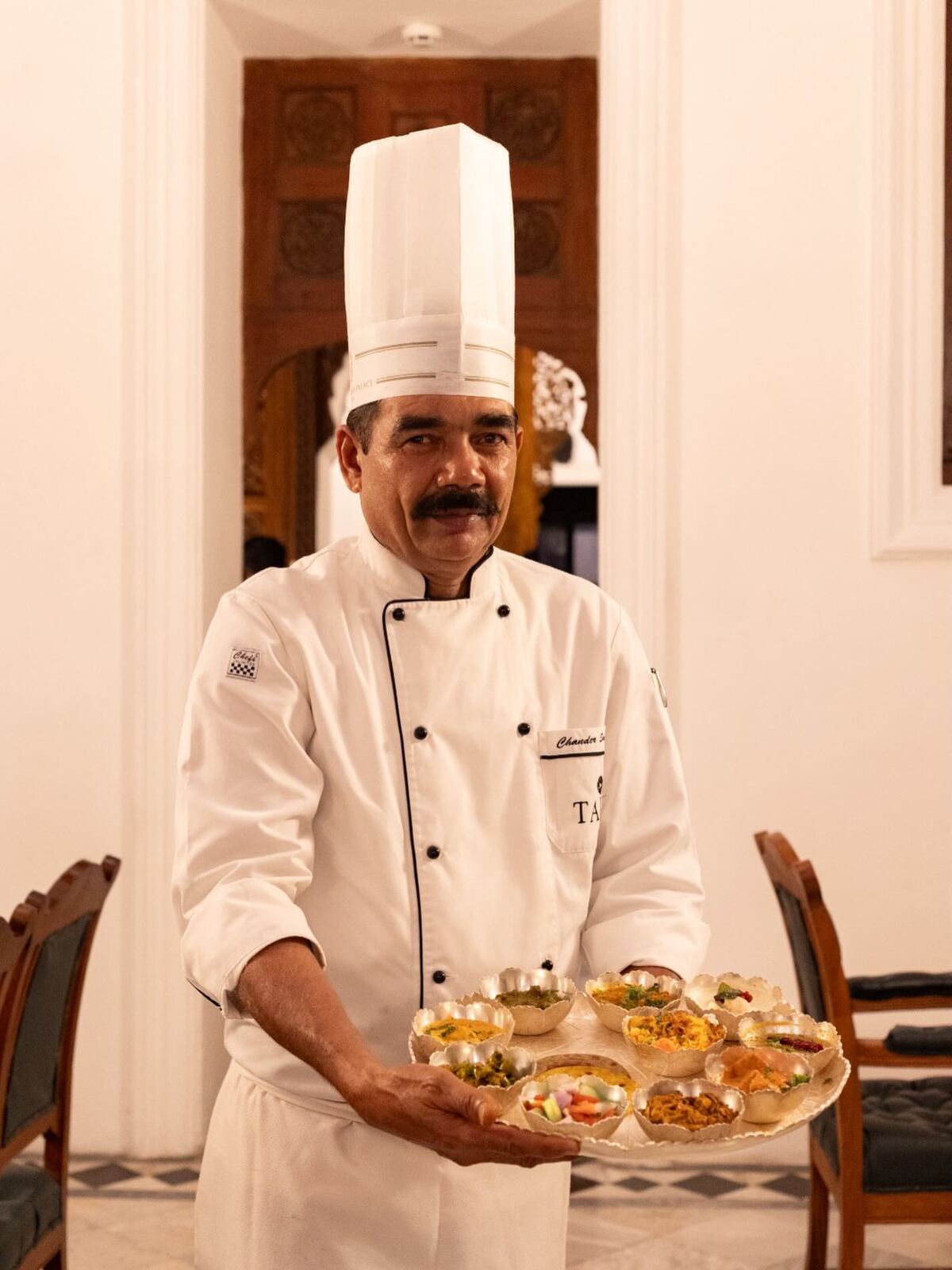 Chef Chander Singh from Umaid Bhawan Palace, Jodhpur, presenting the Marwari thali at Taj Falaknuma Palace, Hyderabad